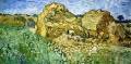 Champ avec des piles de blé Vincent van Gogh